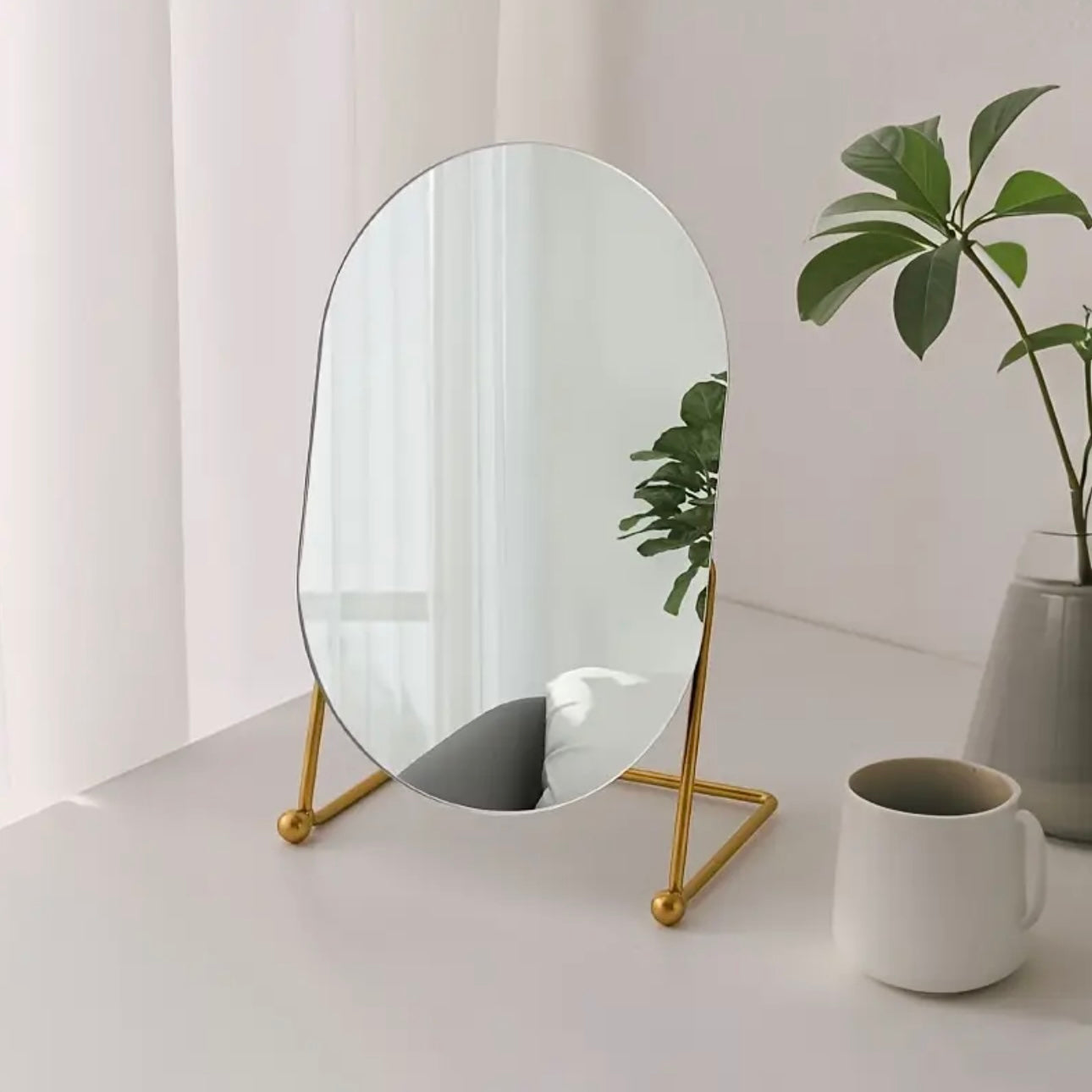 Zenora Frameless HD Irregular Oval Makeup Mirror